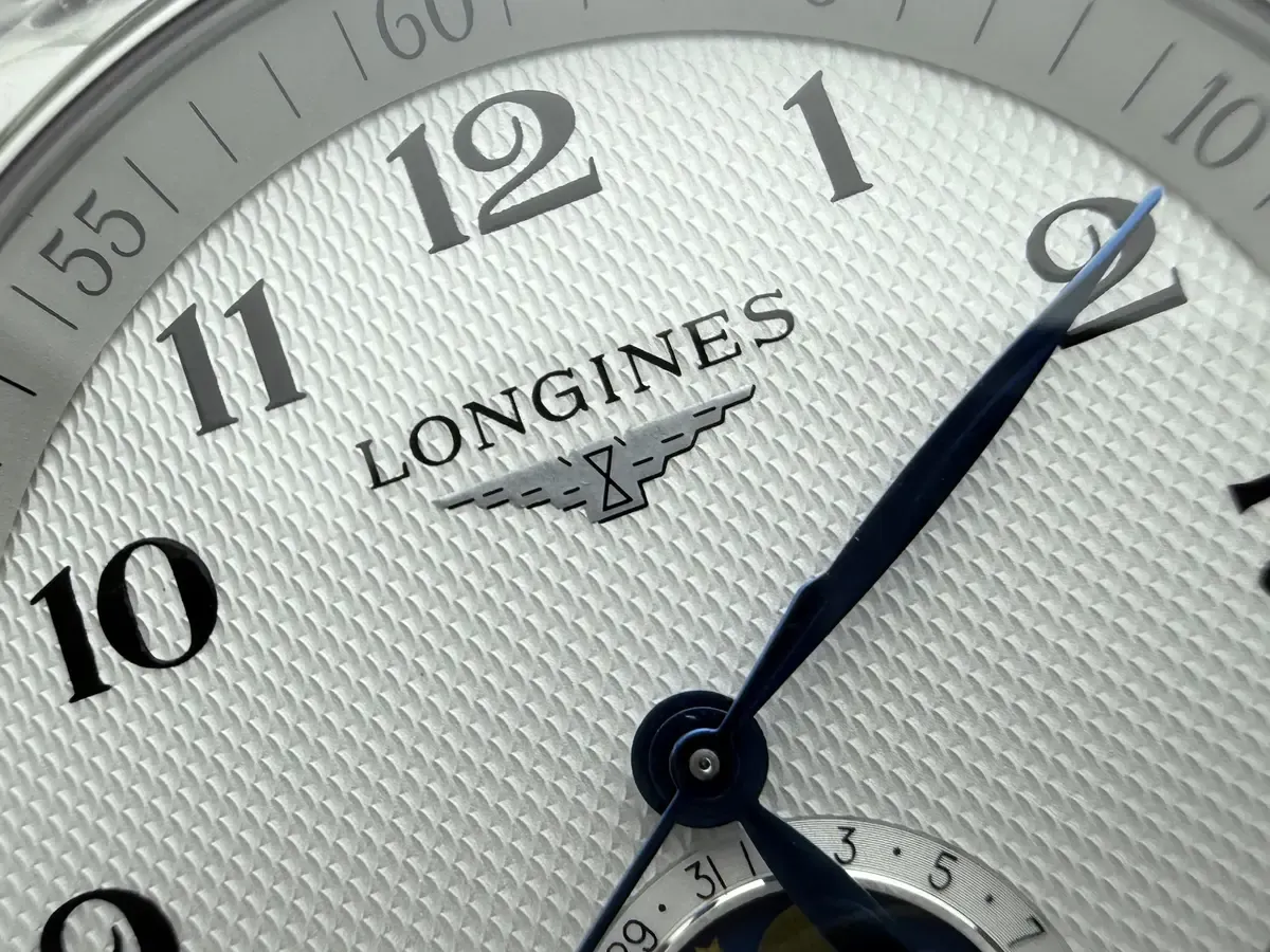 想买APS厂浪琴四针月相？先看看有无破绽！